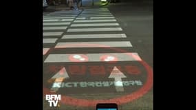 Comment dissuader ceux qui restent scotchés sur leur smartphone en traversant ?