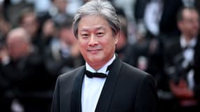 Le réalisateur sud-coréen Park Chan-wook, sur le tapis rouge du Festival de Cannes, le 24 mai 2022