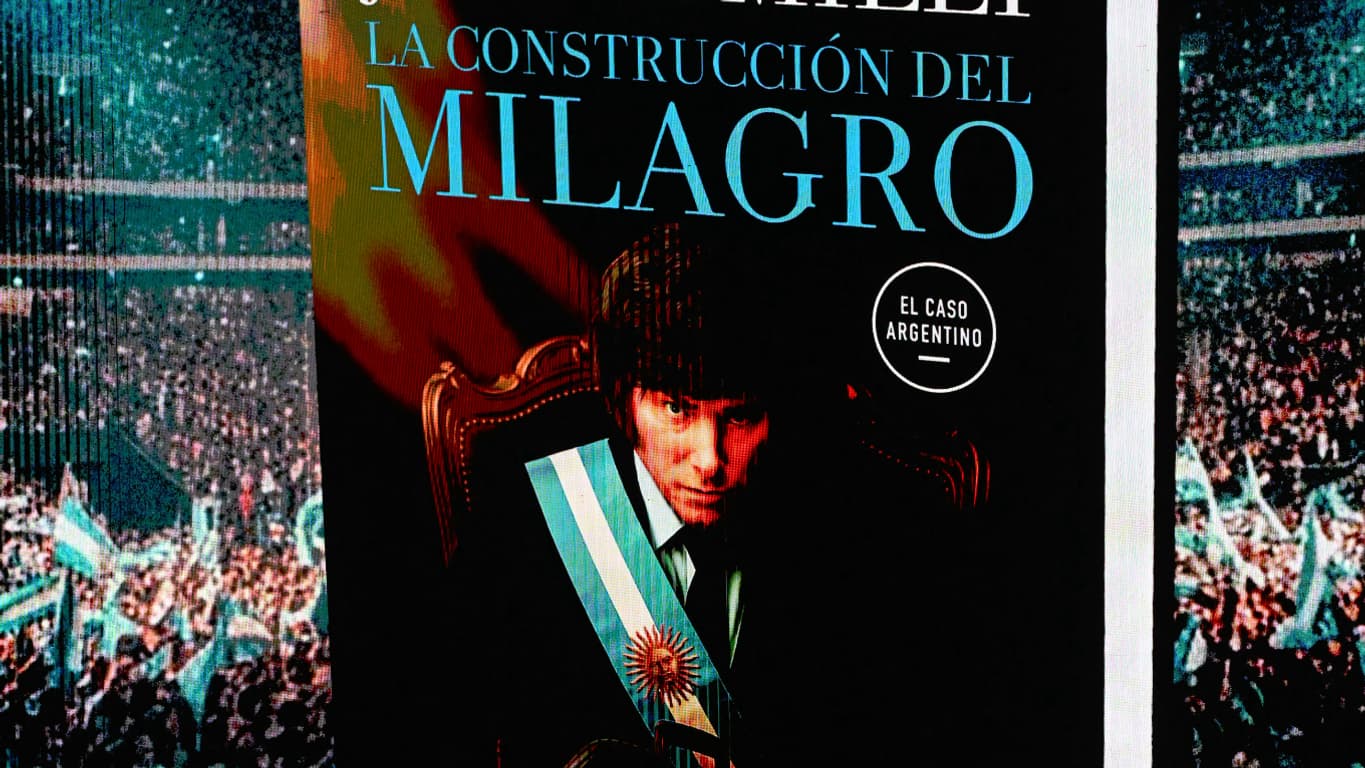Javier Milei in front of the cover of his new book, October 6, 2025 in Buenos Aires (Argentina). 