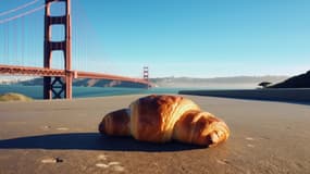 Illustration générée par intelligence artificielle d'un croissant, posé sur le sol, à San Francisco