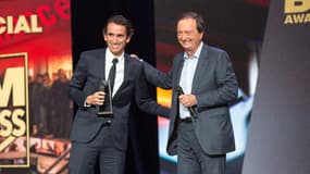 Alexandre Bompard, qui prendra la tête de Carrefour, et Michel-Edouard Leclerc, se sont croisés l'hiver dernier sur la scène eds BFM Awards. 