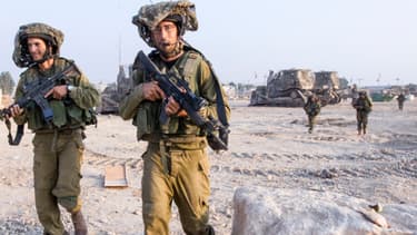 Des soldats israéliens reviennent de Gaza, le 23 juillet 2014.