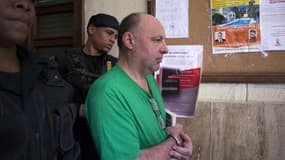 Christophe Naudin escorté au tribunal de Saint-Domingue en République Dominicaine, le 26 octobre 2017