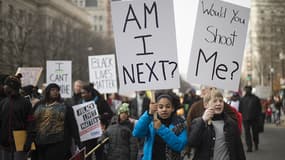Des enfants défilent à Washington: "Suis-je la suivante?", Tu me tirerais dessus?".