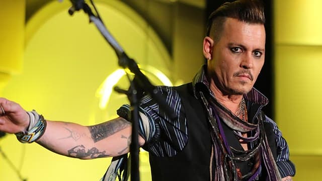 Johnny Depp en concert dans le Minnesota, en juillet 2016.