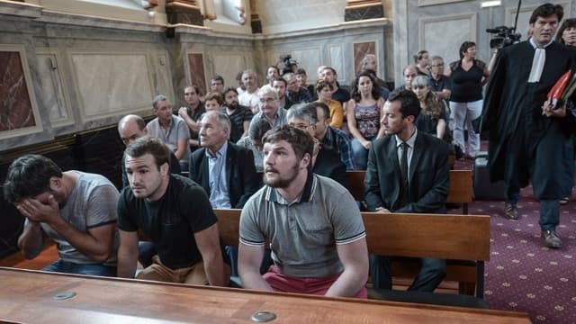 Trois accusés lors du procès.