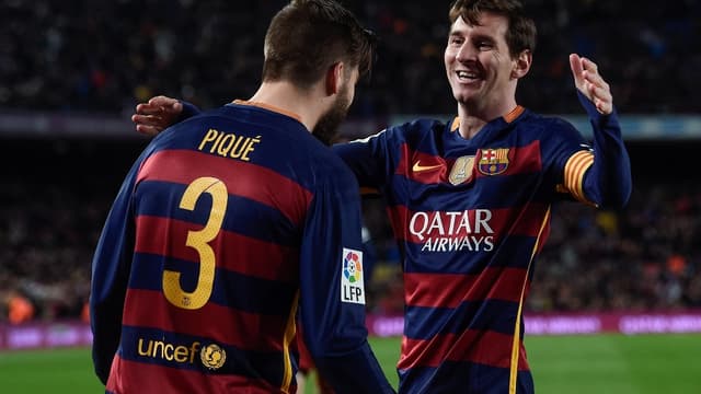 Lionel Messi et Gérard Piqué avec le Barça