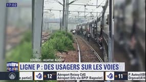Bloqués dans les wagons, des voyageurs ont été invités à descendre sur les rails par des agents de la SNCF. 
