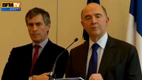 L'ancien ministre du Budget, Jérôme Cahuzac (G), et le ministre de l'Economie Pierre Moscovici