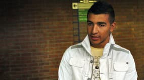 Muhittin Altun, seul rescapé parmi les jeunes électrocutés dans un transformateur à Clichy-sous-Bois, événement déclencheur des émeutes de l'hiver 2005, pose, en août 2006 au palais de justice de Bobigny, avant de comparaître devant le tribunal correctionnel pour avoir caillassé une voiture de police
