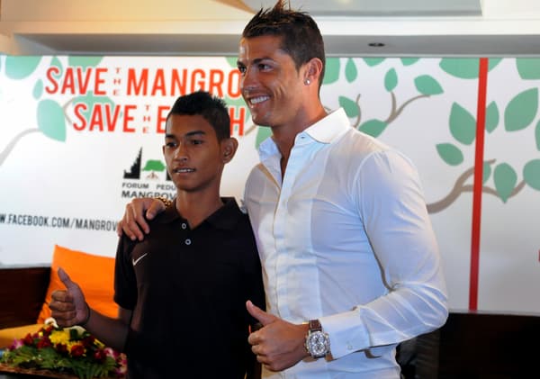 Martunis avec Cristiano Ronaldo en 2013 