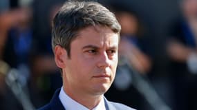 Le Premier ministre Gabriel Attal arrive pour assister au défilé du 14-Juillet, le 14 juillet 2024 à Paris