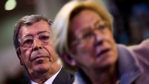 Le député-maire LR de Levallois-Perret Patrick Balkany (g) et son épouse Isabelle Balkany, le 3 décembre 2015 à Rueil-Malmaison près de Paris