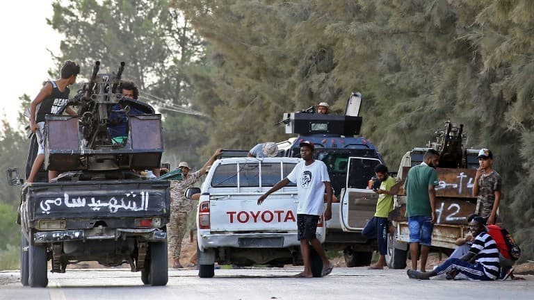 Des combattants dans Tripoli.