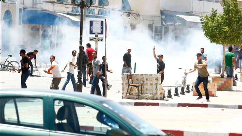 Des affrontements ont éclaté dimanche à Kairouan (photo) et Tunis entre la police et des salafistes protestant contre l'interdiction du rassemblement annuel de leur organisation, Ansar al Charia, dont le gouvernement islamiste modéré juge qu'elle représen