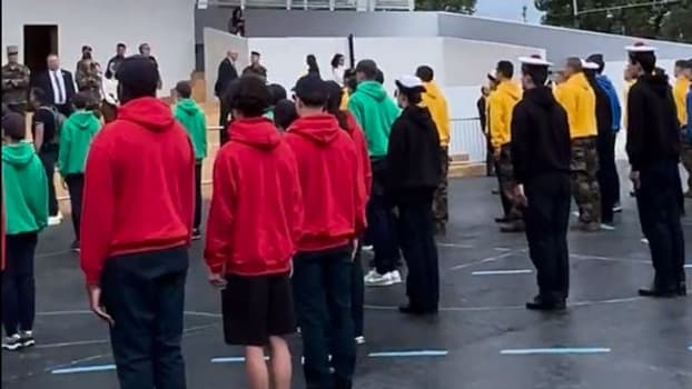 Des jeunes en train de former les anneaux olympiques pendant les répétitions du 14 juillet, le 11 juillet 2024 Des jeunes en train de former les anneaux olympiques pendant les répétitions du 14 juillet, le 11 juillet 2024