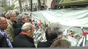 Hommage national: les Parisiens se recueillent sur les lieux des attentats