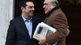 Alexis Tsipras (à gauche) et Angel Gurria (à droite)