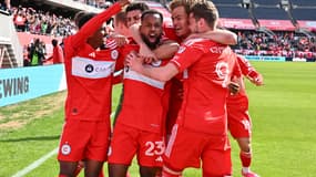 Kellyn Acosta (au centre), auteur d'un but incroyable pour offrir la victoire au Chicago Fire face à Montréal 