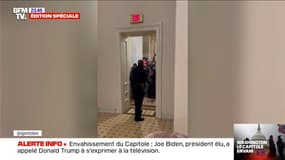 Capitole envahi par des partisans de Donald Trump: l'image de ce policier, seul, face aux manifestants