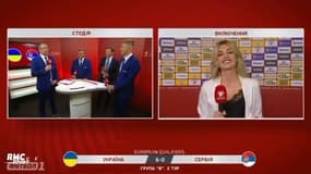 Ukraine - Oleksandr Zinchenko embrasse une journaliste après la victoire contre la Serbie