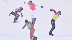 Faye Gulini, Meryeta Odine, Chloe Trespeuch et Kristina Paul en snowboardcross, à Zhangjiakou le 12 février 2022