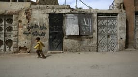 Un enfant dans le quartier d'Al-Qaboun, au nord-est de Damas, le 13 mars 2016.