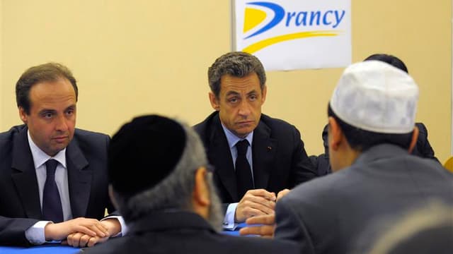 Nicolas Sarkozy lors d'une rencontre avec des responsables religieux mardi à Drancy. Deux jours après François Hollande, le président-candidat s'est rendu à son tour en Seine-Saint-Denis, où il a accusé son rival socialiste de n'avoir "pas une seule idée"
