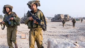 Des soldats israéliens reviennent de Gaza, le 23 juillet 2014.