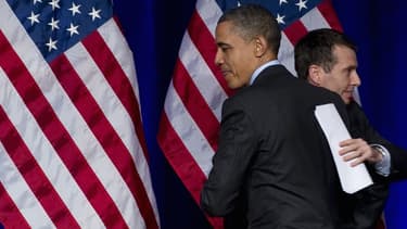 Depuis 2008, Ils sont plus d'une dizaine de l'administration Obama a avoir rejoint les géants de la tech. Sur la photo, le président américain avec David Plouffe qui travaille désormais pour Uber.