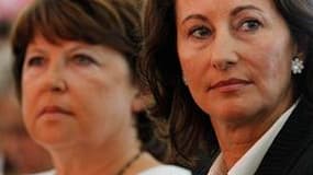 Ségolène Royal (à droite) en compagnie de Martine Aubry fin août à La Rochelle. Les dirigeants du Parti socialiste ont appuyé vendredi le plaidoyer de la présidente de la région Poitou-Charentes pour maintenir le droit à la retraite à 60 ans si le PS revi