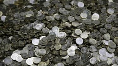 Cinq ans après la création de la journée de solidarité, une mission parlementaire affirme qu'une partie des deux milliards d'euros récoltés chaque année a été affectée au colmatage du trou de la Sécurité sociale. /Photo d'archives/REUTERS/Leonhard Foeger