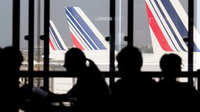 Passagers en attente d'un vol Air France.