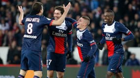 Les joueurs du PSG fêtent un but au Parc des princes le 2 mars 2014.