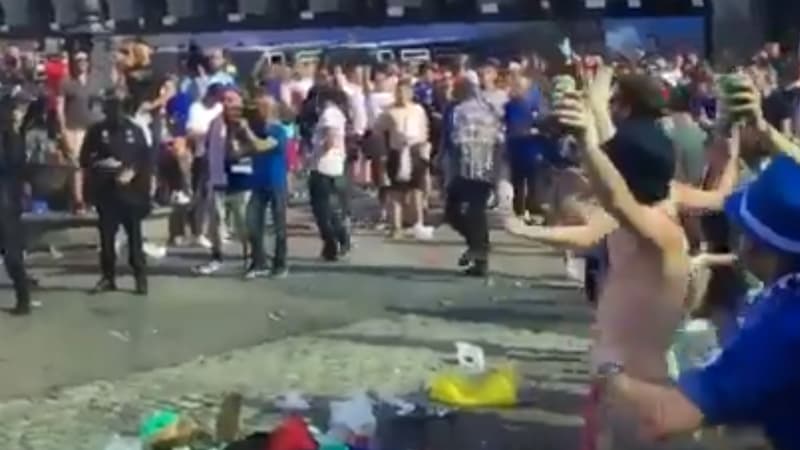 Les supporters de Leicester face à la police espagnole, à Madrid, avant le quart de finale aller entre leur club et l'Atlético.