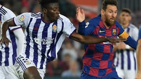 Mohammed Salisu au duel avec Lionel Messi