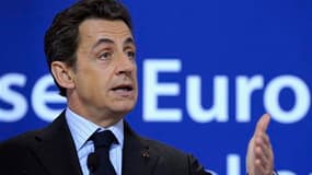 Nicolas Sarkozy a estimé vendredi, à l'issue du Conseil européen, que Laurent Gbagbo devait se plier sans délai au verdict des urnes sous peine d'encourir des sanctions européennes et d'avoir affaire au tribunal pénal international. /Photo prise le 17 déc