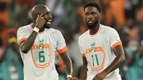 Les Ivoiriens Seko Fofana et Jean-Philippe Krasso lors d'un match de la CAN, le 22 janvier 2024
