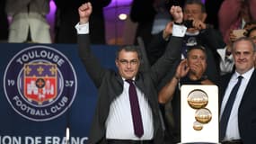 Damien Comolli célébrant le titre de champion de L2 du TFC