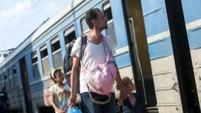 Des migrants à la frontière entre la Macédoine et la Grèce, le 9 juillet 2015