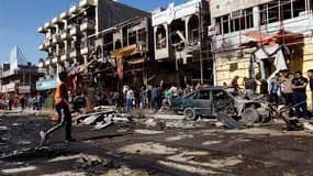 Après un attentat à la voiture piégée dans le quartier d'al Mashtal à Bagdad. L'explosion de voitures piégées et un attentat suicide dans des quartiers chiites de Bagdad et au sud de la capitale irakienne ont fait au moins 50 morts mardi au dixième annive