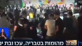 Violences au Proche-Orient: les images choc d'un Arabe israélien lynché en direct à la télévision