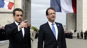 Nicolas Sarkozy et François Hollande lors de la cérémonie du 8-Mai à Paris, en 2012.