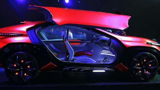 Chery a dévoilé sa vision du SUV du futur, tout en agressivité, entre lignes acérées et couleur rouge intense. Le petit plus: les films en hologramme. Chery a dévoilé sa vision du SUV du futur, tout en agressivité, entre lignes acérées et couleur rouge intense. Le petit plus: les films en hologramme.