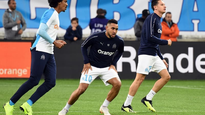 Dimitri Payet (au centre) s'échauffe