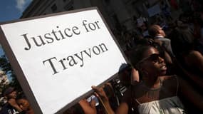 Manifestants dans les rues de Brooklyn, à New York. Barack Obama a lancé un appel au calme, dimanche, après l'acquittement de George Zimmerman pour le meurtre de Trayvon Martin, un adolescent noir de 17 ans tué l'an dernier en Floride, tandis que des mill