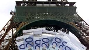 La prévision de croissance économique pour la France en 2012, actuellement de 2,25% du PIB, sera vraisemblablement revue à la baisse, rapporte mardi le quotidien Les Echos en citant l'entourage de Nicolas Sarkozy. /Photo d'archives/REUTERS/Charles Platiau