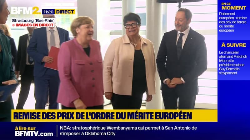 L'ancienne chancelière allemande Angela Merkel arrive à la cérémonie de remise des distinctions de l'ordre européen du Mérite