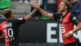 Ola Toivonen félicité par Kamil Grosicki
