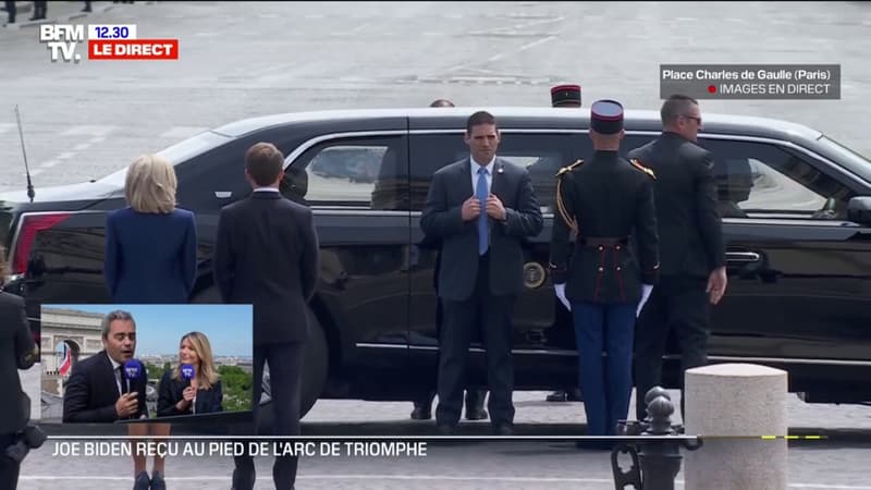 Joe Biden accueilli par Emmanuel Macron au pied de l'Arc de Triomphe